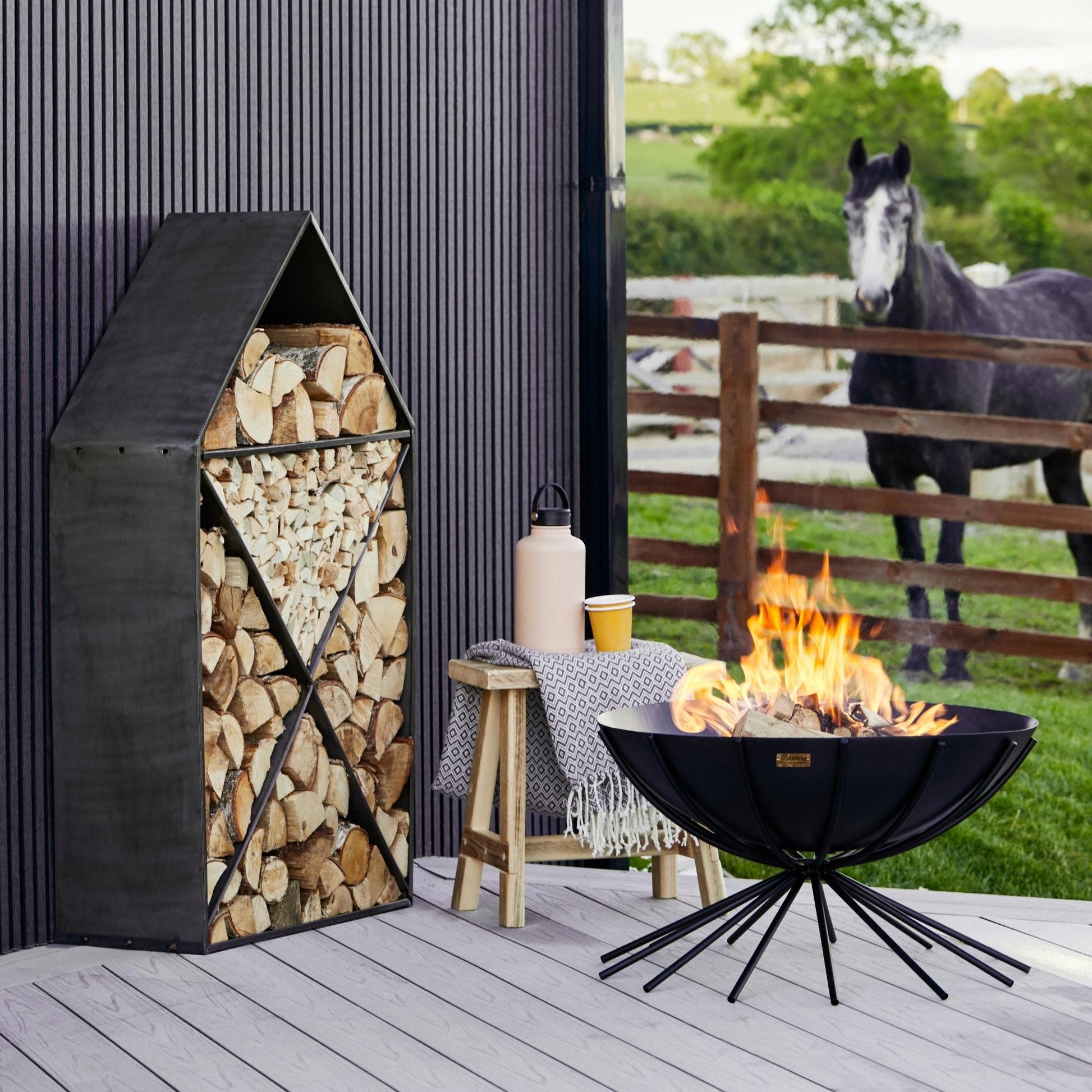 Metal Outdoor Dakota Fire Pit in Black by Ivyline - Mouse & Manor