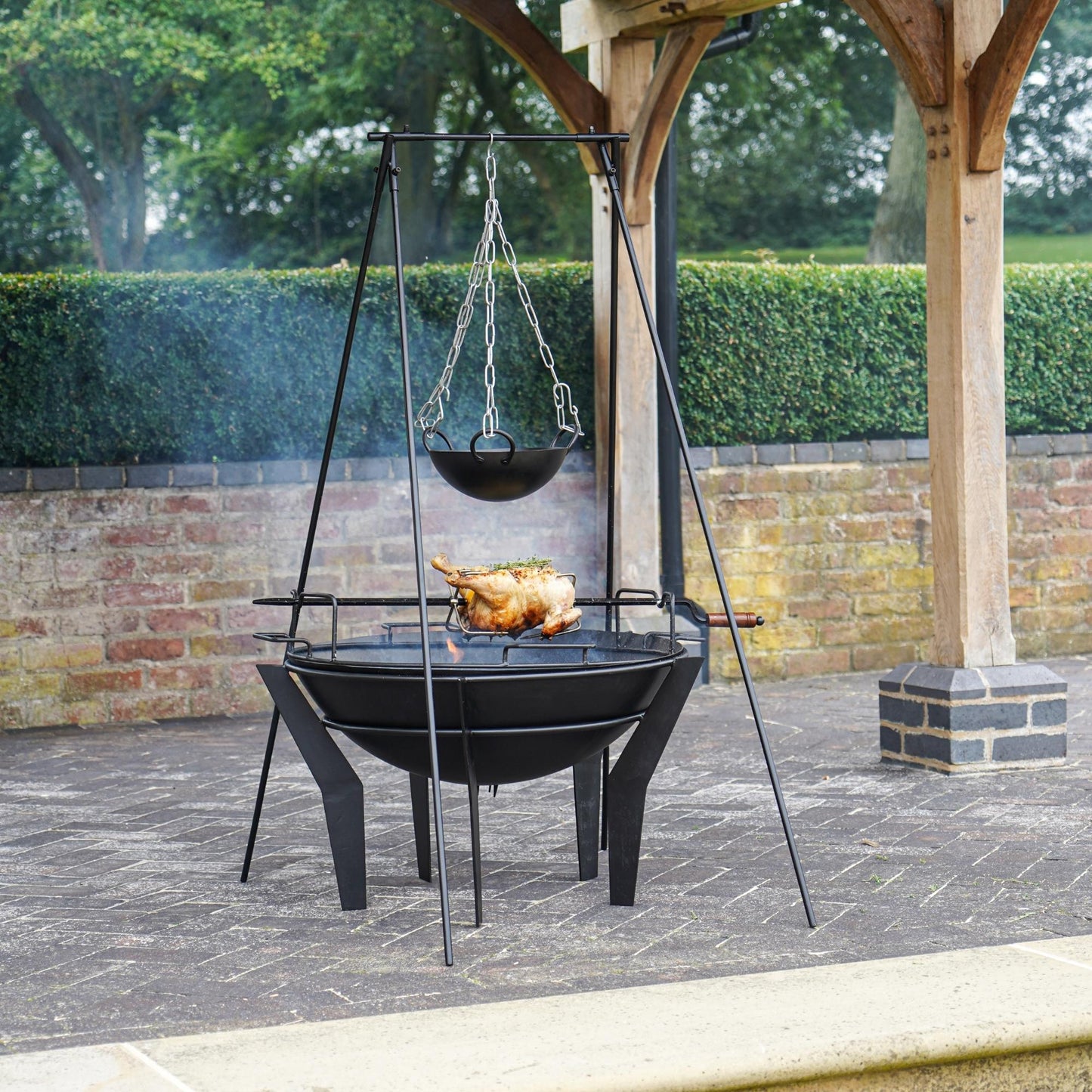 Metal Kendal Outdoor Fire Pit on Stand in Black by Ivyline - Mouse & Manor