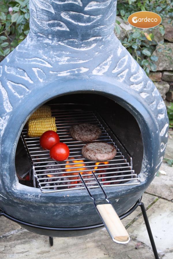 Clay chiminea with outlet grill